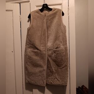 Max Mara reversible long vest for women. Beige color. Shearling on one side.